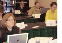 Students concentrating on an SEO exercise